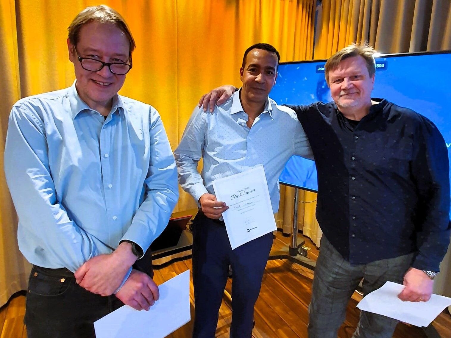 Vuoden tyypit -äänestyksessä palkitut Kiertokaaren työntekijät Reko Turja, Said Kadouri ja Mika Inkala.